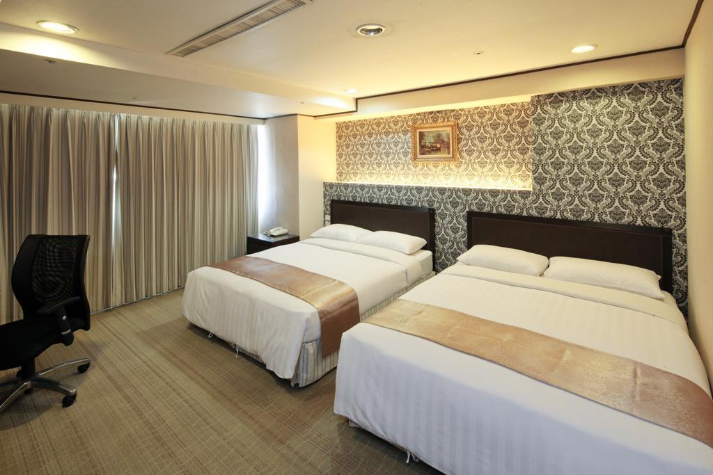 Lincoln Hotel تاينان الغرفة الصورة