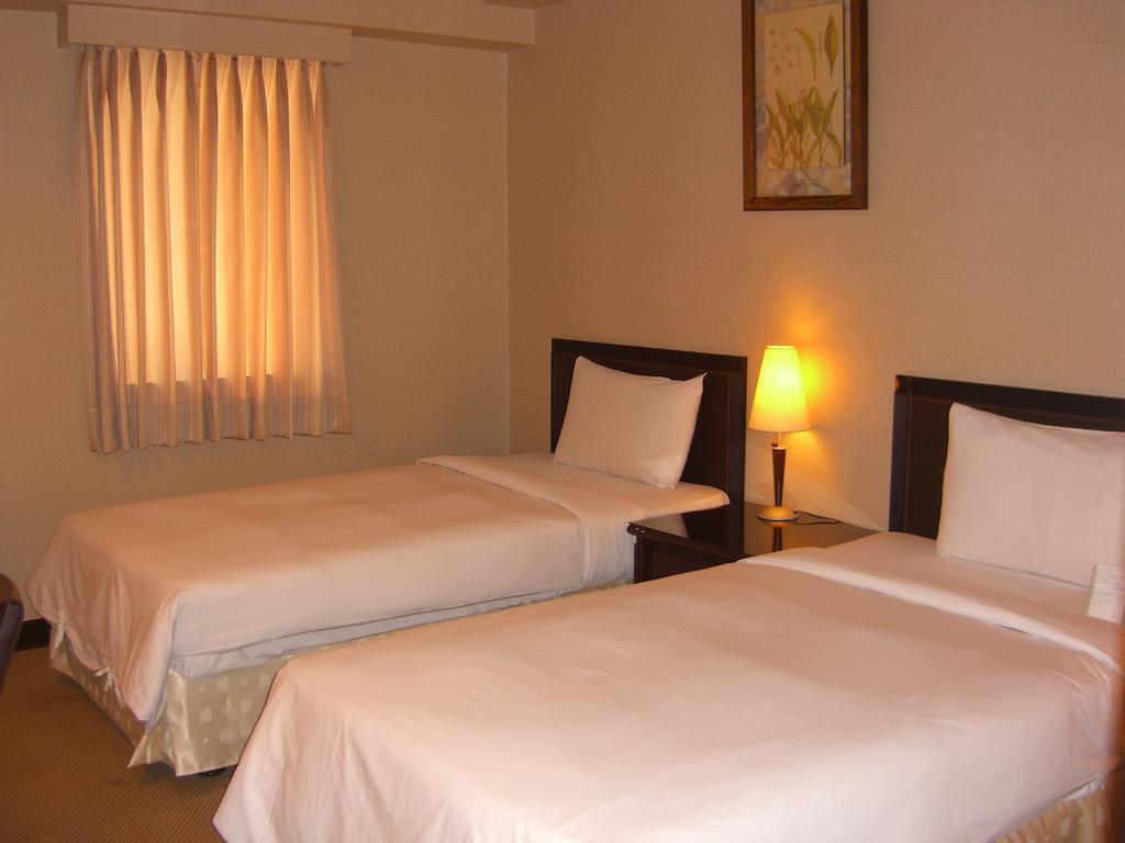 Lincoln Hotel تاينان الغرفة الصورة